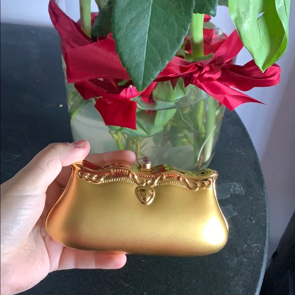 Beautiful gold beauty and the beast mini purse